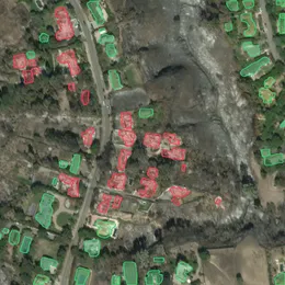 Predicted damage per building on the same scene.